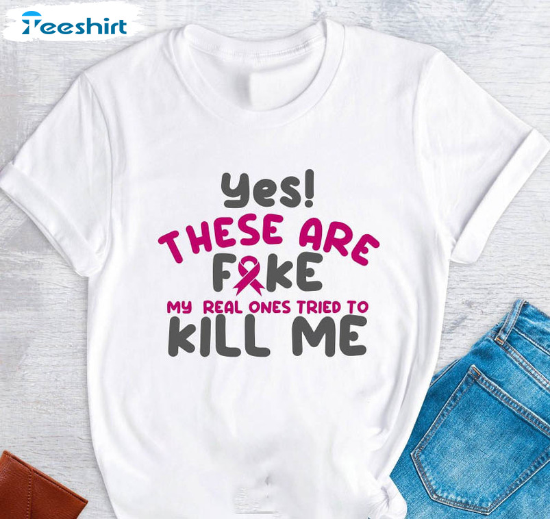 Yes These Are Fake My Real Ones Tried To Kill Me Shirt, Breast Cancer Short Sleeve Crewneck