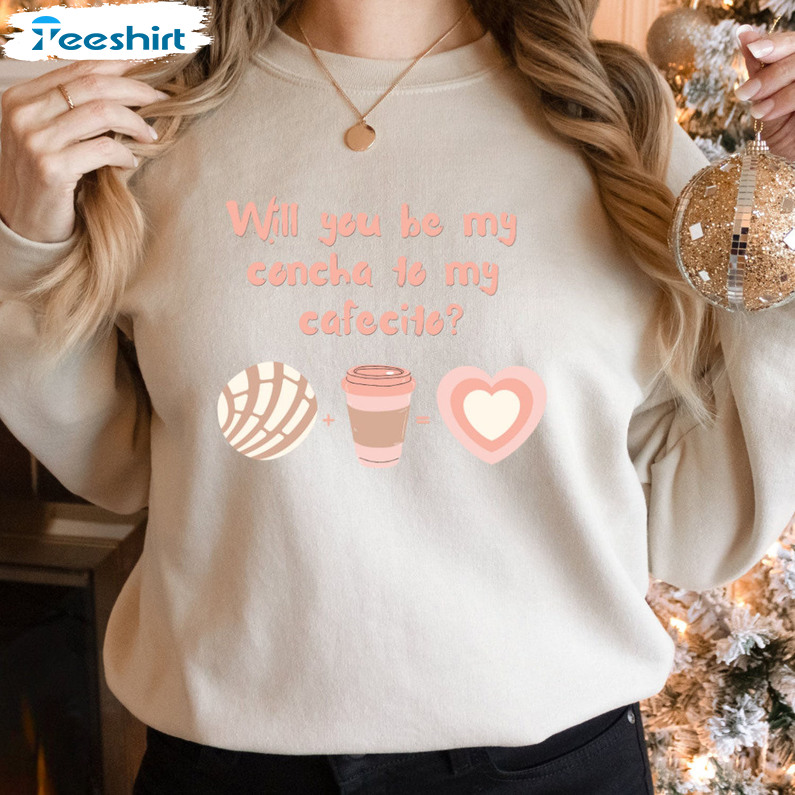 https://img.9teeshirt.com/images/desgin/113/trending/5f7cd2/27-will-you-be-my-concha-to-my-cafecito-pan-dulce-conchas-sweatshirt-couples-valentine-s-day-gift-0.jpg