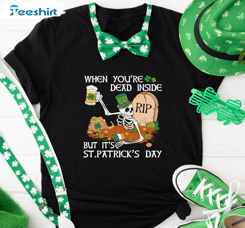 When You're Dead Inside But It's Patricks Day Trendy Shirt, Skeleton Drinks In Cemetery Short Sleeve Crewneck