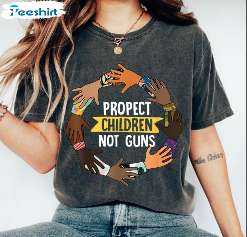 Protect Kids Not Guns Trendy Shirt, Gun Control Crewneck Unisex Hoodie