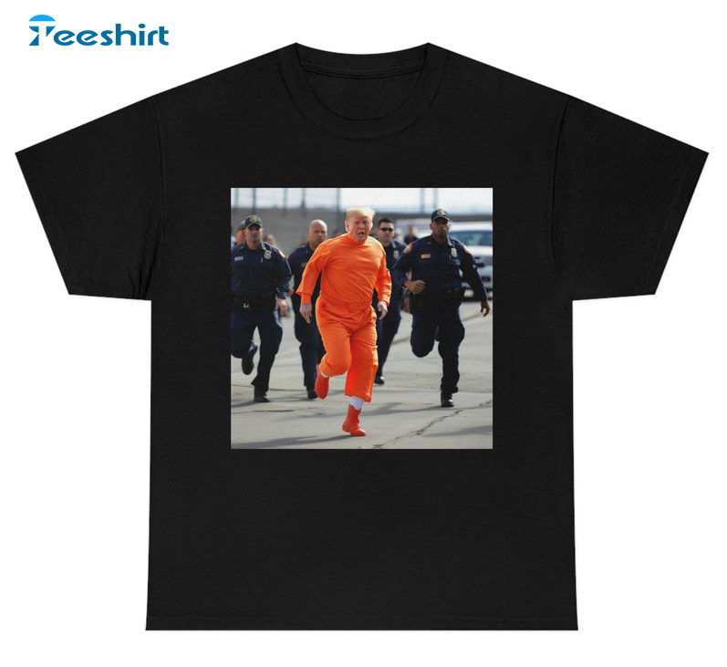 Donald Trump Running Away From Cops In Orange Jumpsuit Shirt, Donald Trump Jail Unisex Hoodie Crewneck