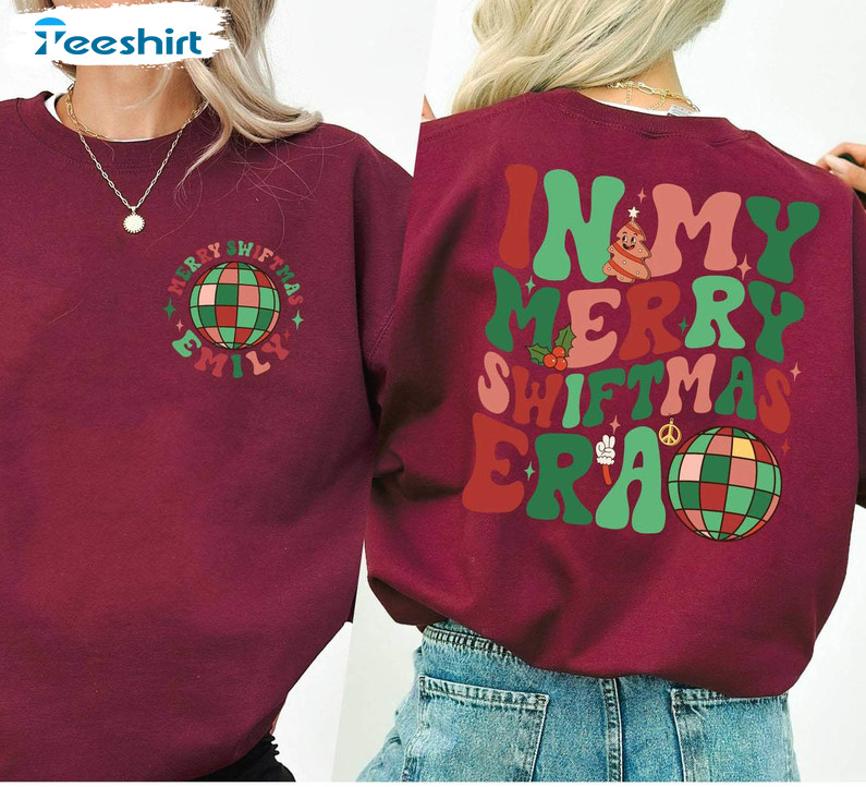 https://img.9teeshirt.com/images/desgin/327/trending/5sw26q/14-merry-swiftmas-era-sweatshirt-santa-s-favorite-swiftie-christmas-gift-for-ts-fan-christmas-spirit-1.jpg