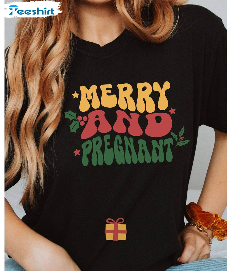 Merry And Pregnant Christmas Shirt, Groovy Pregnancy Announcement Unisex T Shirt Short Sleeve