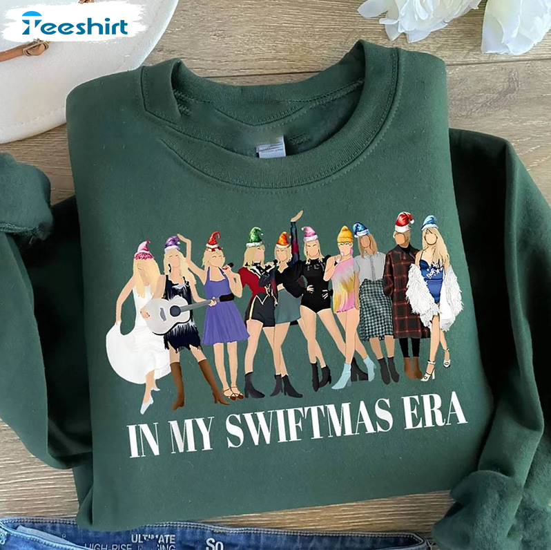 Merry Swiftmas Shirt, The Eras Tour Christmas Unisex Hoodie Crewneck Sweatshirt