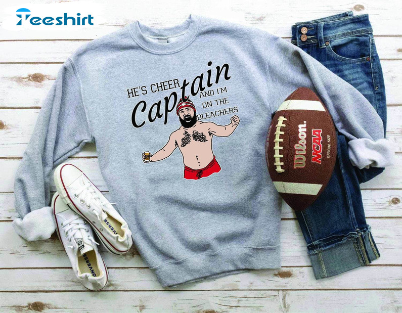 Fantastic He's Cheer Captain Football Era Sweatshirt , Modern Jason Kelce Shirt Hoodie