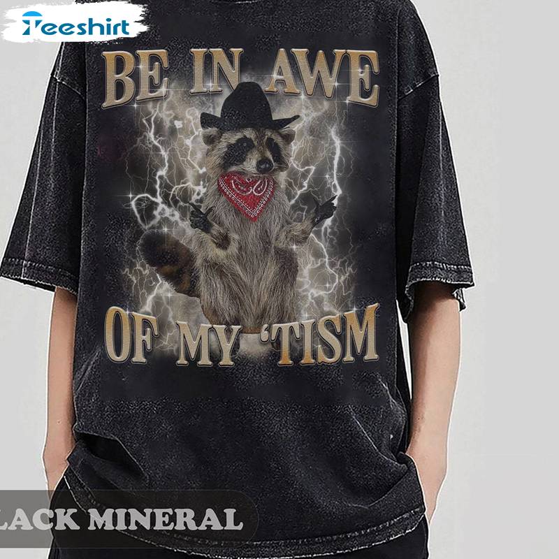 Be In Awe Of My Tism Trendy Shirt, Funny Cowboy Racoon Long Sleeve Sweater