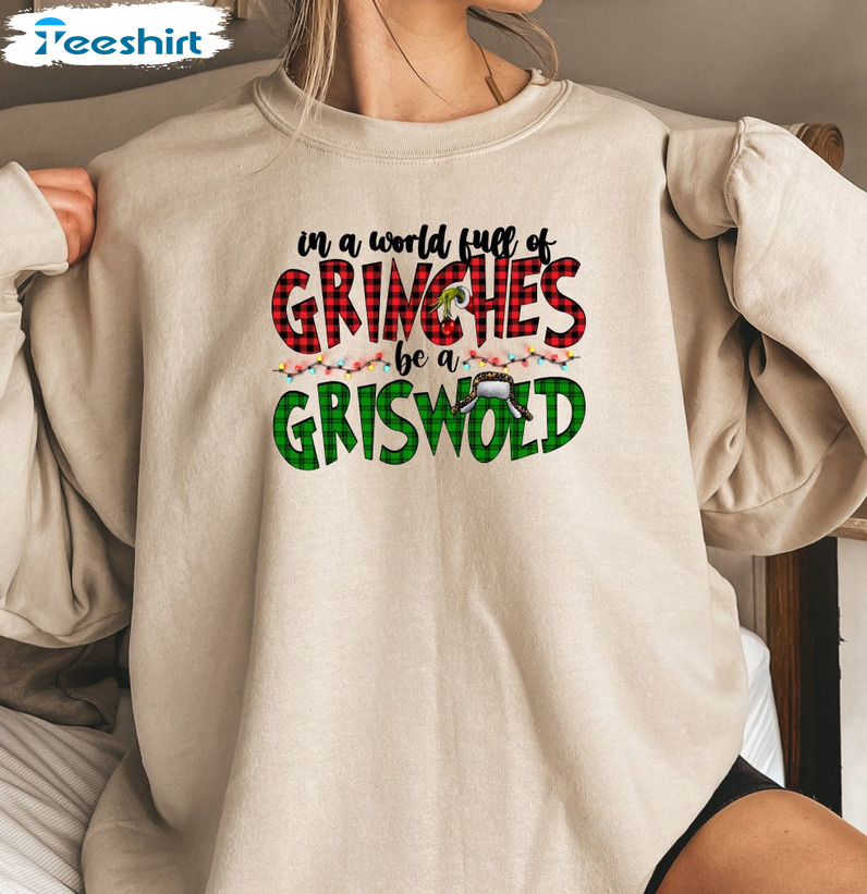 In A World Full Of Grinches Be A Griswold Shirt - Funny Grinch Sweater Unisex Hoodie
