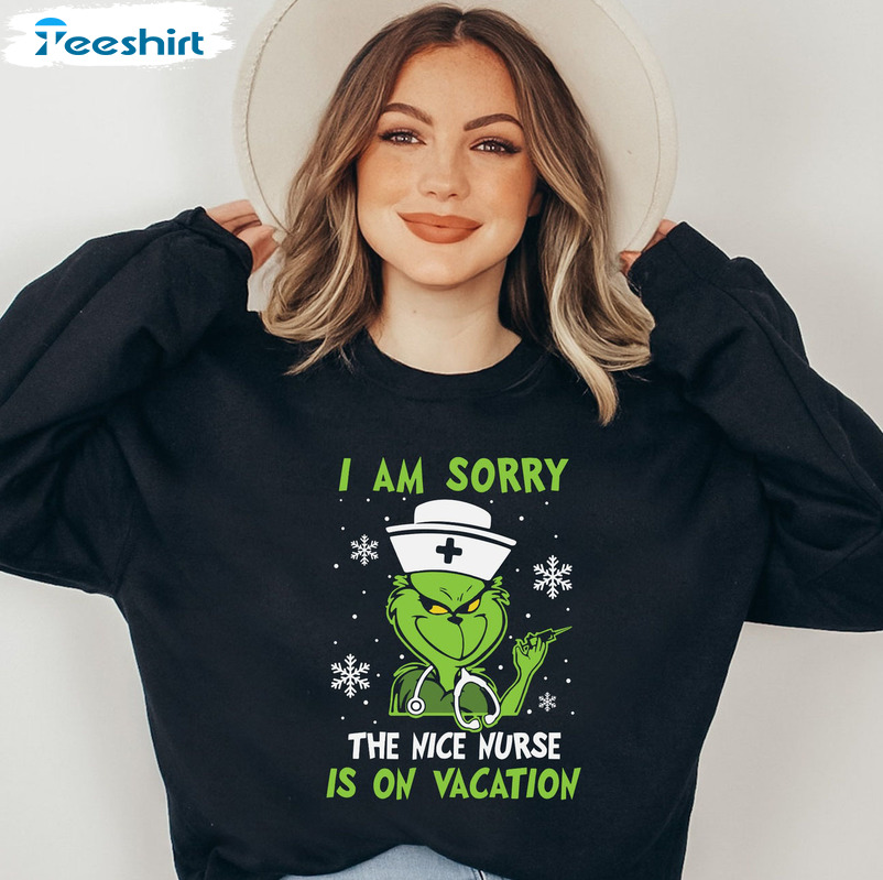I Am Sorry The Nice Nurse Is On Vacation Sweatshirt - Grinch Nurse Short Sleeve Unisex Hoodie